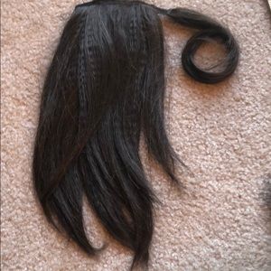 Hair extension in a pony tail